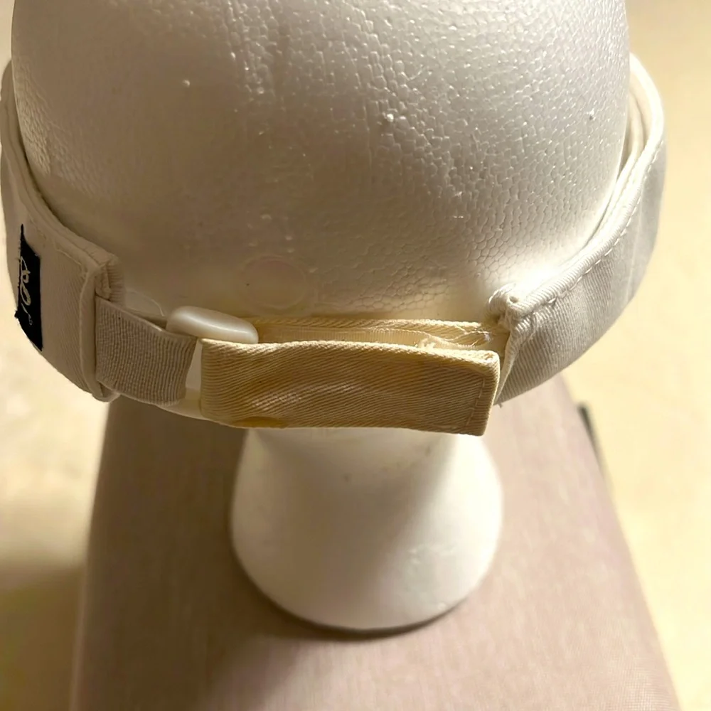 Atlantis. Paradise Island. White Atlantis Visor Hat. NWOT. One size fits all.